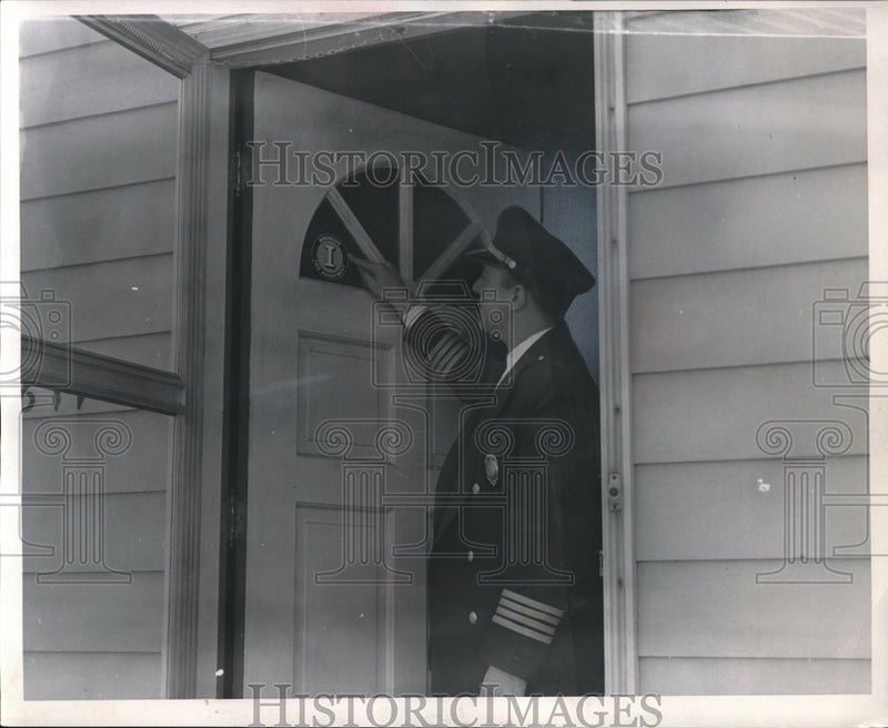 Load image into Gallery viewer, 1961 Press Photo Rescue Markers being placed on the windows of Brooklyn homes
