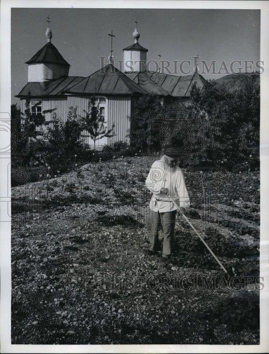 1962 Press Photo Brother Timofej Prochorov Tends Garden By Self Built Temple