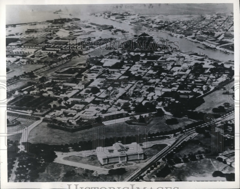 Load image into Gallery viewer, 1941 Press Photo Walled City section of Manila after Japanese bombing attack

