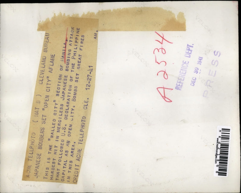Load image into Gallery viewer, 1941 Press Photo Walled City section of Manila after Japanese bombing attack
