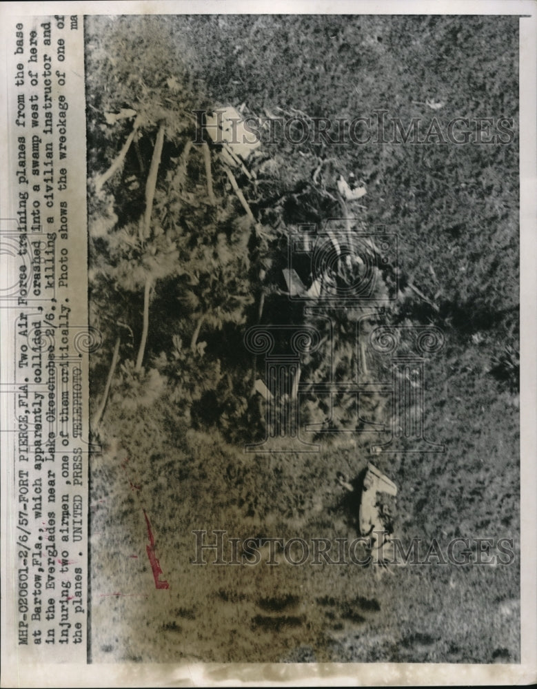1957 Press Photo Two Air Force training planes crash into swamp, Fort Pierce, FL