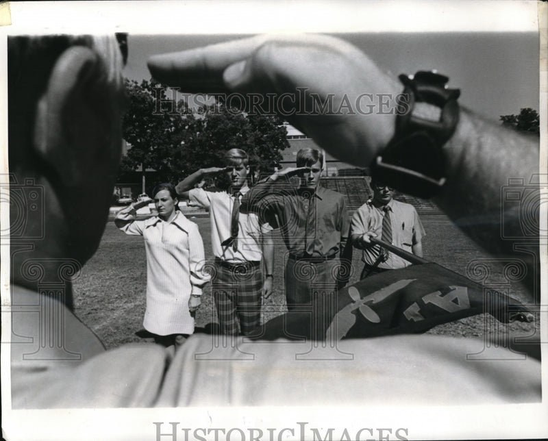 Load image into Gallery viewer, 1970 Press Photo Carol Earp Returning Salute in Air Force ROTC
