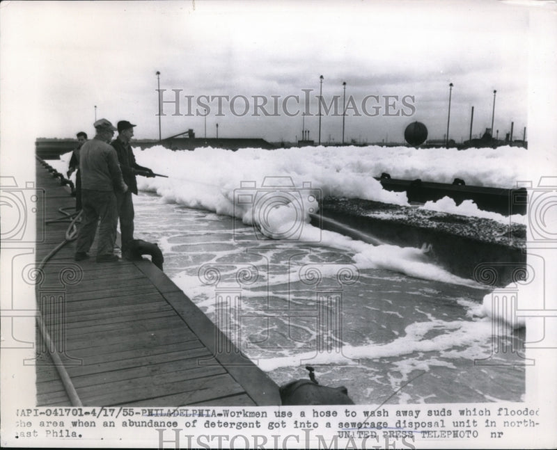 Load image into Gallery viewer, 1955 Press Photo Philadelphia workers wash away suds which flooded area
