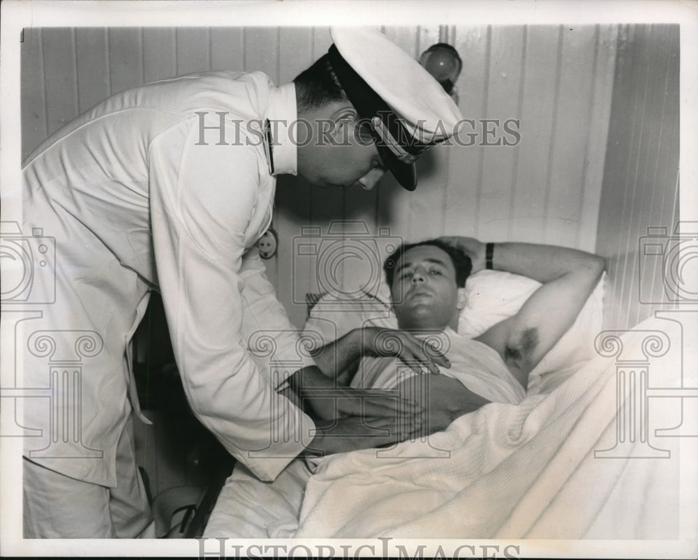 1939 Press Photo Dr. Aaron Christensen Examines Stanley Godfrey For Appendicitis