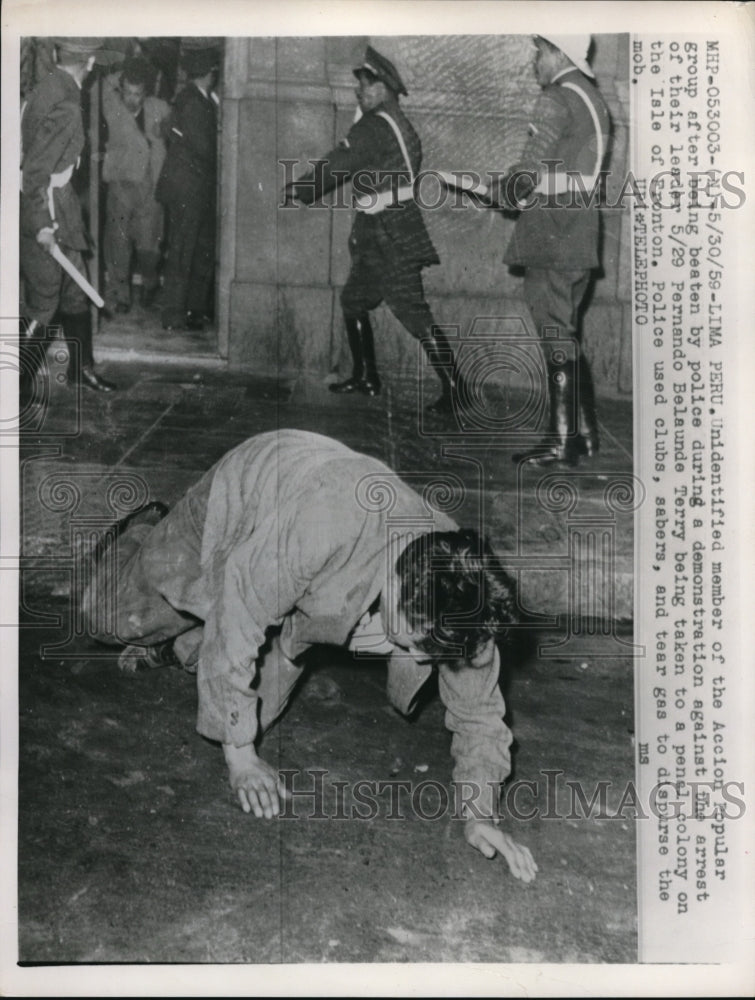 1959 Press Photo Unidentified Member of the Accion Popular Group After Being