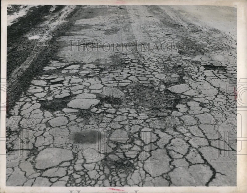 Load image into Gallery viewer, 1960 Press Photo Potholes &amp; erosion in Fairview Park roads in Cleveland Ohio
