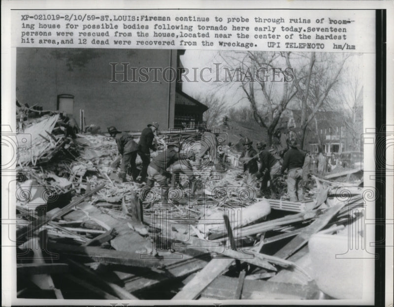 Load image into Gallery viewer, 1959 Press Photo Firemen at rescue work in St Louis Mo after tornado
