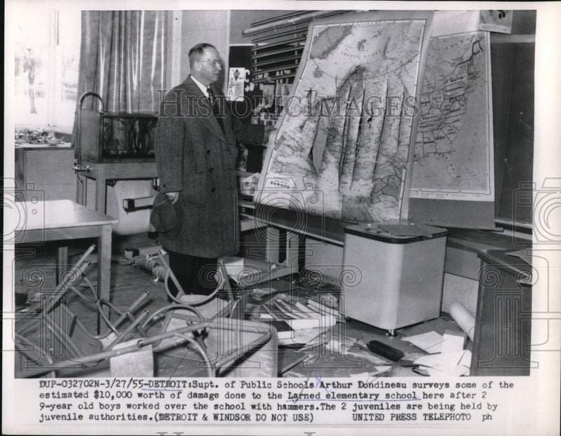 Load image into Gallery viewer, 1955 Press Photo Detroit Mich Supt of Schools Arthur Dondineau &amp; vandalism
