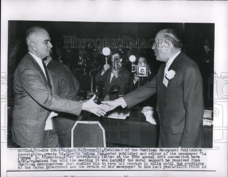 Load image into Gallery viewer, 1956 Press Photo Dr. Alberto Gainza Greeted by Richard W. Slocum at70th Annual
