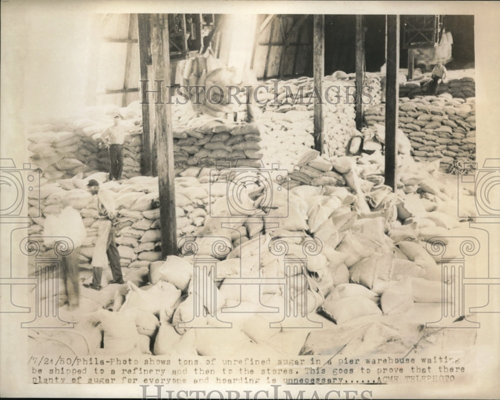 1950 Press Photo Unrefined Sugar in Pier Warehouse Philadelphia