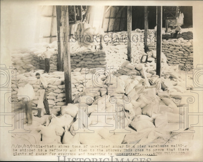 Load image into Gallery viewer, 1950 Press Photo Unrefined Sugar in Pier Warehouse Philadelphia
