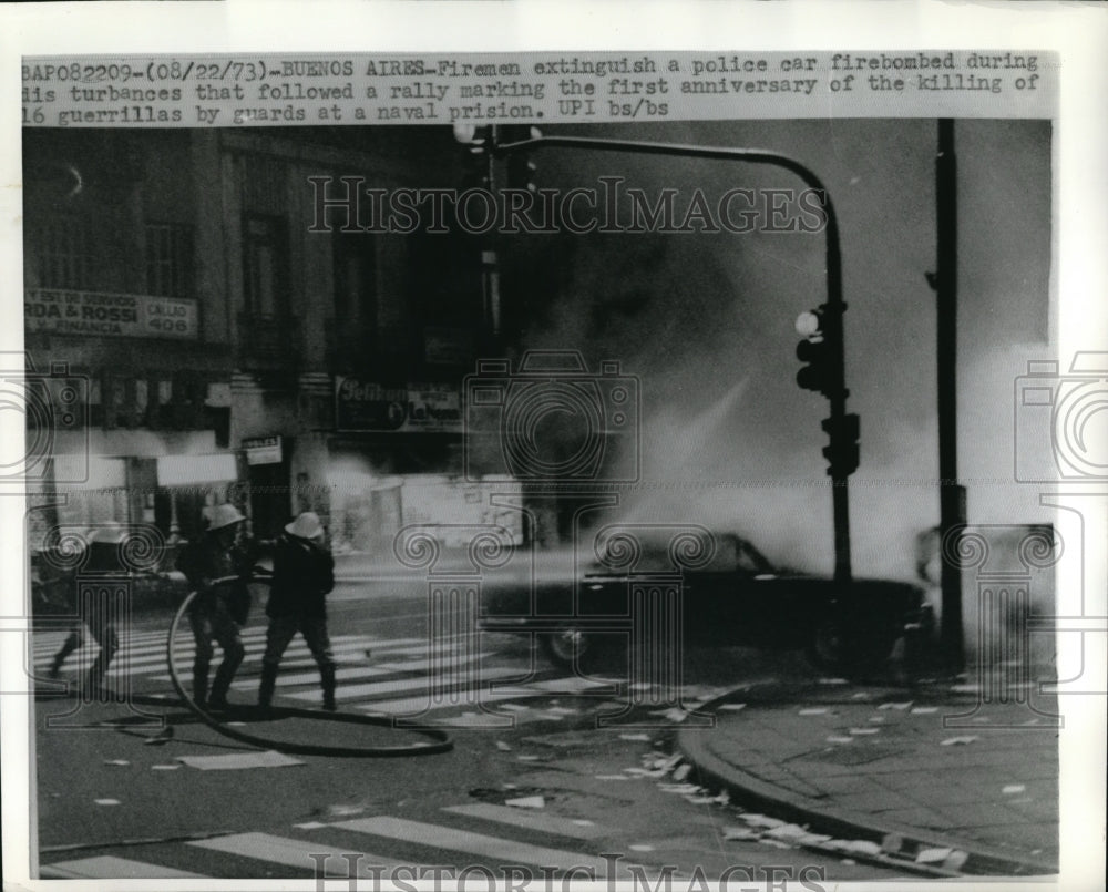 1973 Press Photo Firemen Extinguish Car After Protesters Lit It on Fire in