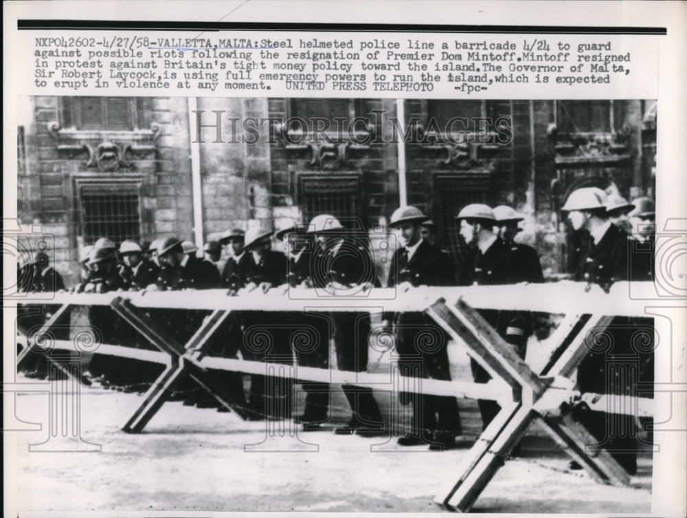 1958 Press Photo Steel helmeted Police line a barricade to guard against