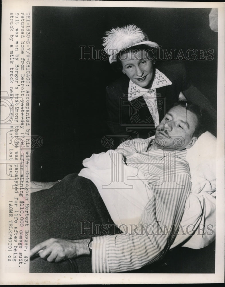 Load image into Gallery viewer, 1948 Press Photo Chicago accompanied by wife Herbert Borger returned home from
