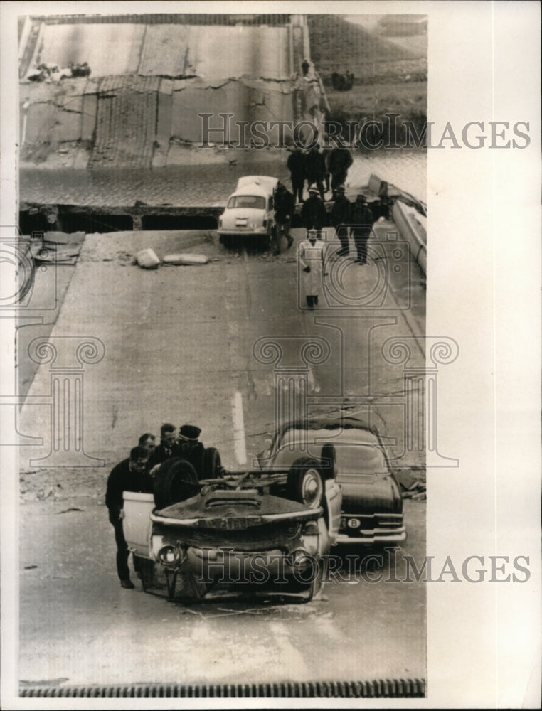 Load image into Gallery viewer, 1966 Press Photo Philippe Botty Looks At His Overturned Which Killed His Father
