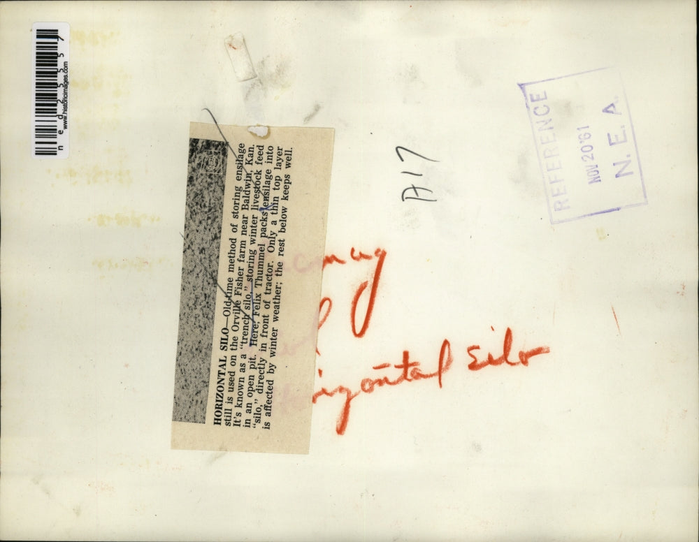 1960 Press Photo Felix Thummel Packs Lensilage Into "Silo" In Front Of Tractor