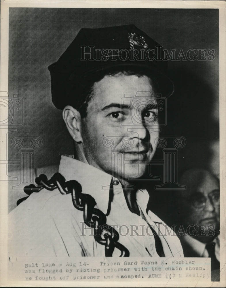 1951 Press Photo Salt Lake Guard Wayne E Hoobler Flogged By Rioting Prisoner