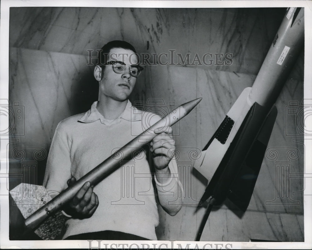 1956 Press Photo John Thornton holding his homemade missile