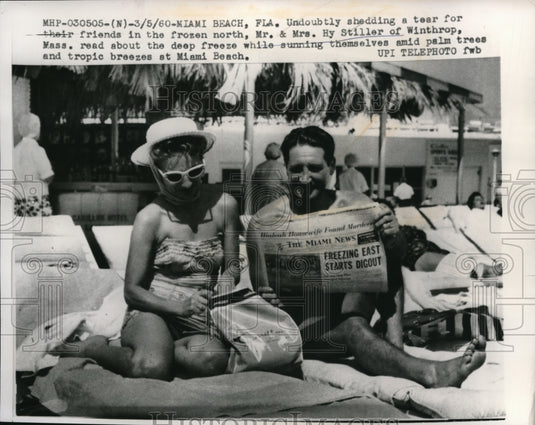 1960 Press Photo Miami Beach Mr & Mrs Hy Stiller of Winthrop Mass read about the- Historic Images