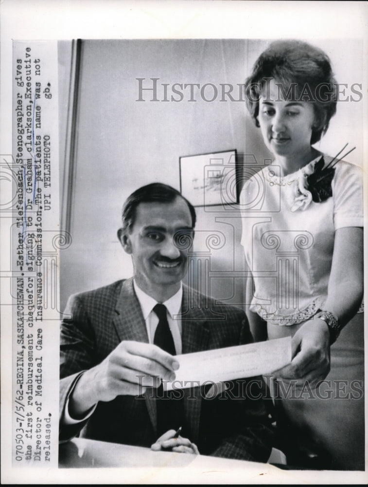 Load image into Gallery viewer, 1962 Press Photo Esther Tiefenbach gives cheque to Dr. Graham Clarkson
