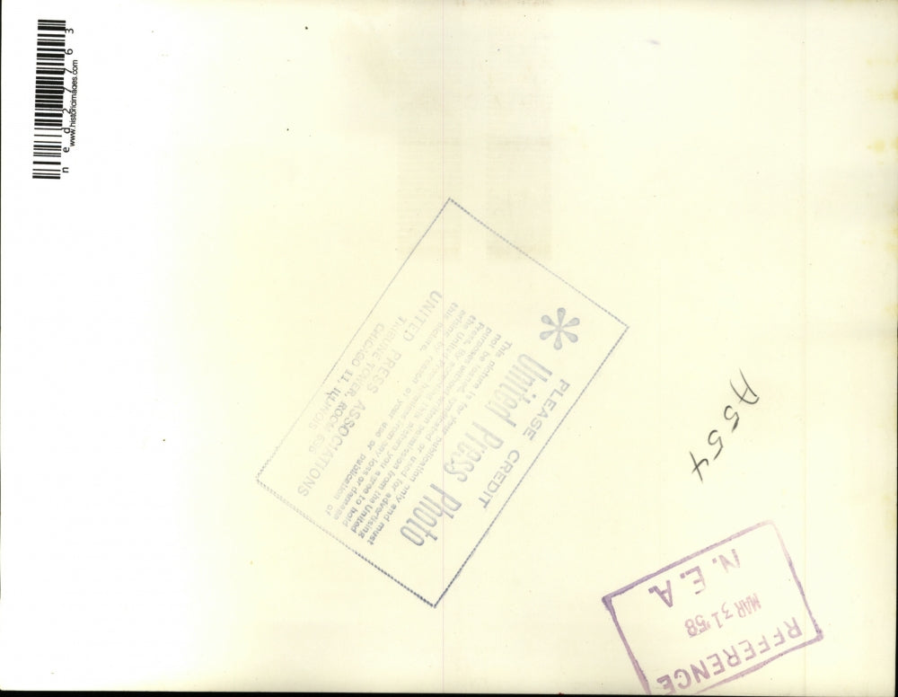 1958 Press Photo Brazilian playboy Francisco "Baby" Pignatari in front of picket