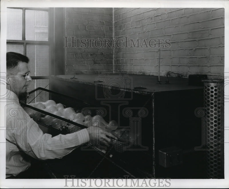 Load image into Gallery viewer, 1954 Press Photo General Electric working checking base of laps
