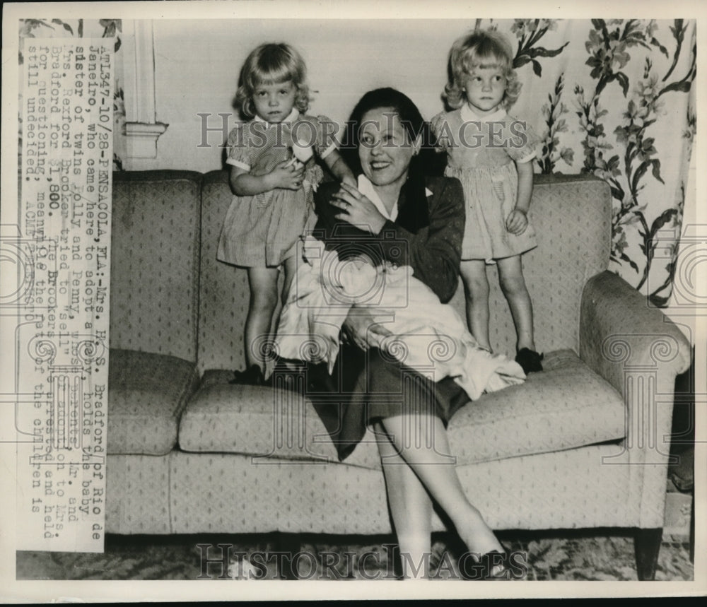 1947 Press Photo Mrs. H. S. Bradford holding a baby she came to U.S. to adopt