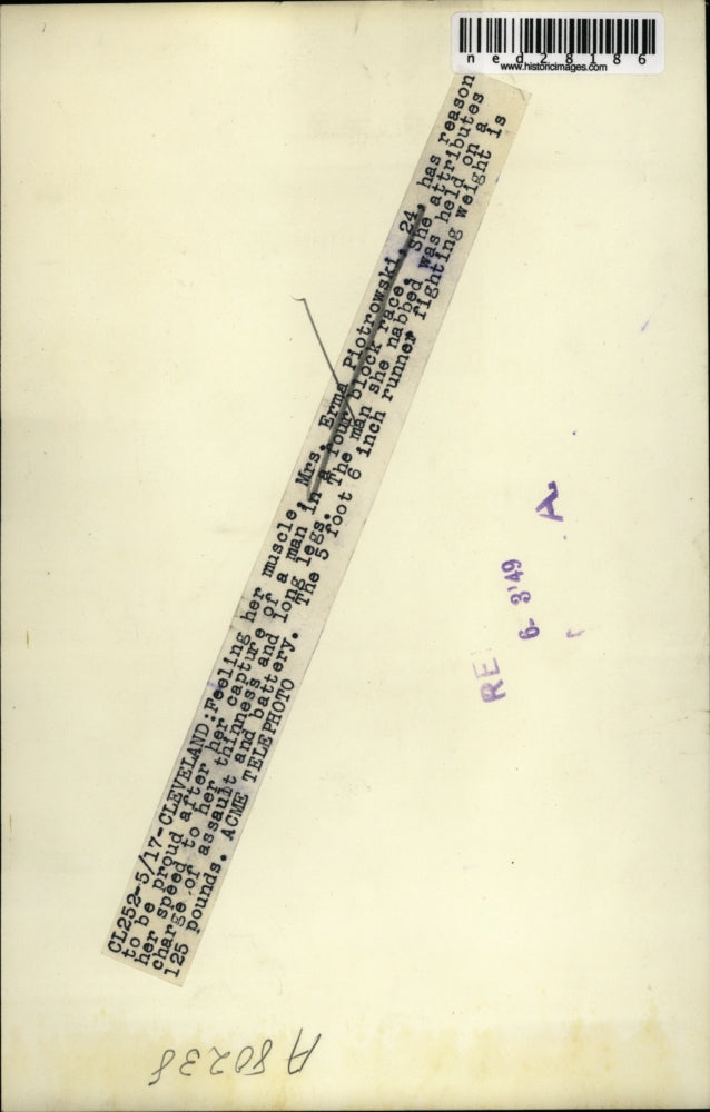 1949 Press Photo Erma Piotrowski feels muscles after catching runaway assaulter