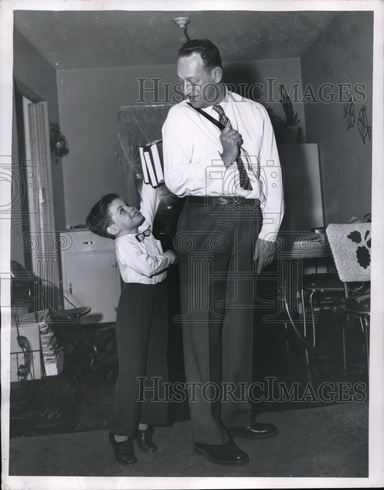 Load image into Gallery viewer, 1957 Press Photo 45 year old grad Paul Stevens and grandson Phillip Markland
