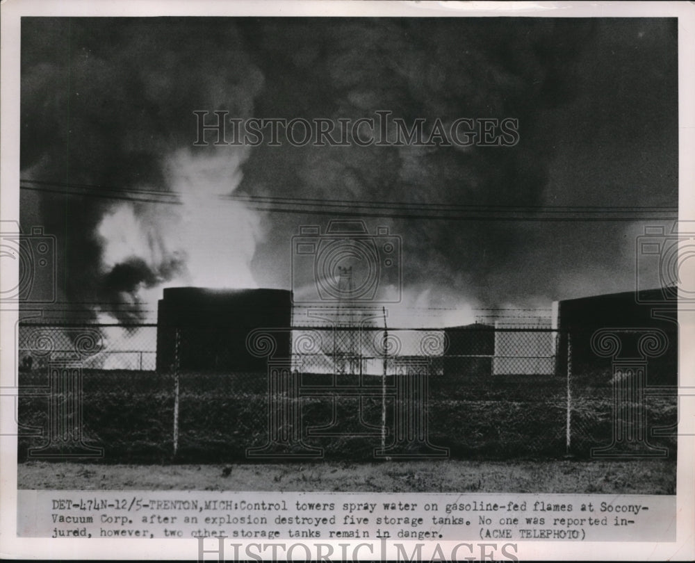 1951 Press Photo Control Towers Spray Water On Gasoline Fed Flames