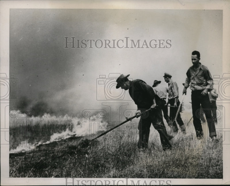 Load image into Gallery viewer, 1939 Press Photo Fire Fighters Put Out Fires
