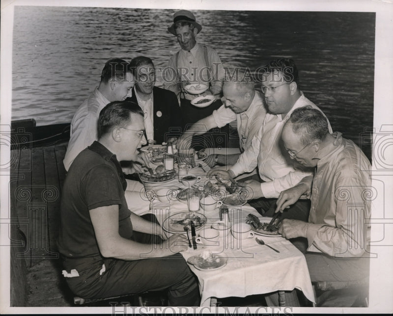 Load image into Gallery viewer, 1938 Press Photo Fishermen Enjoy A Banquet During 1st Of Fishing Season
