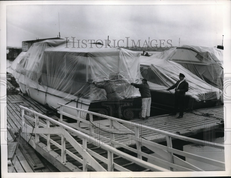 Load image into Gallery viewer, 1955 Press Photo Workers But Plastic Covers Over Yachts For The Winter
