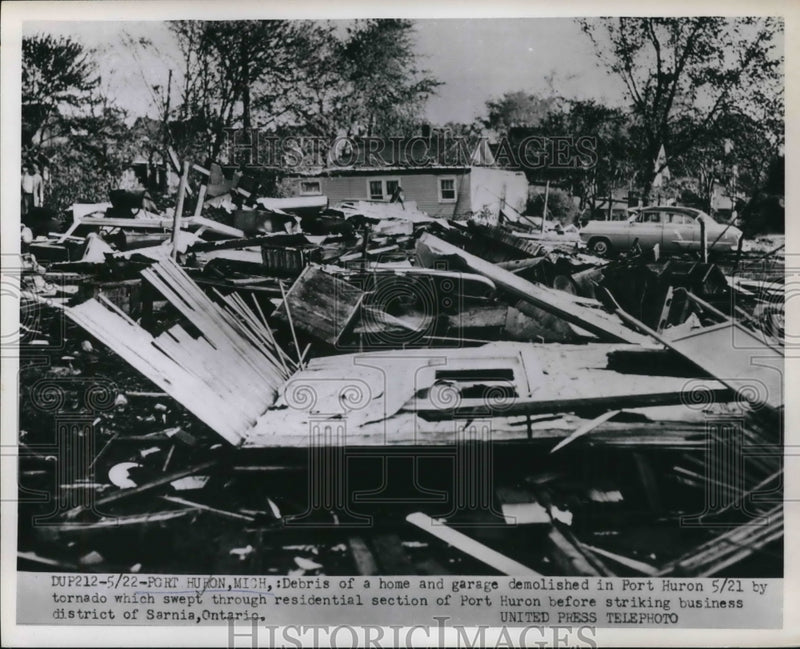 Load image into Gallery viewer, 1953 Press Photo Port Huron Mich debris of home and garage demolished by tornado

