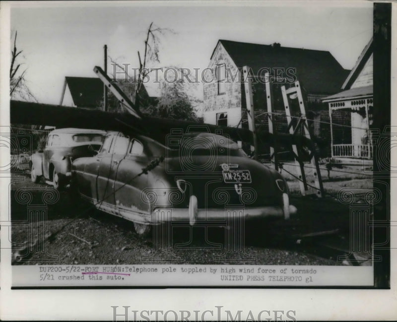 Load image into Gallery viewer, 1950 Press Photo Port Huron Telephone pole toppled by wind force of tornado
