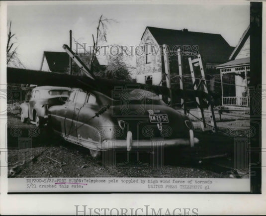 1950 Press Photo Port Huron Telephone pole toppled by wind force of tornado