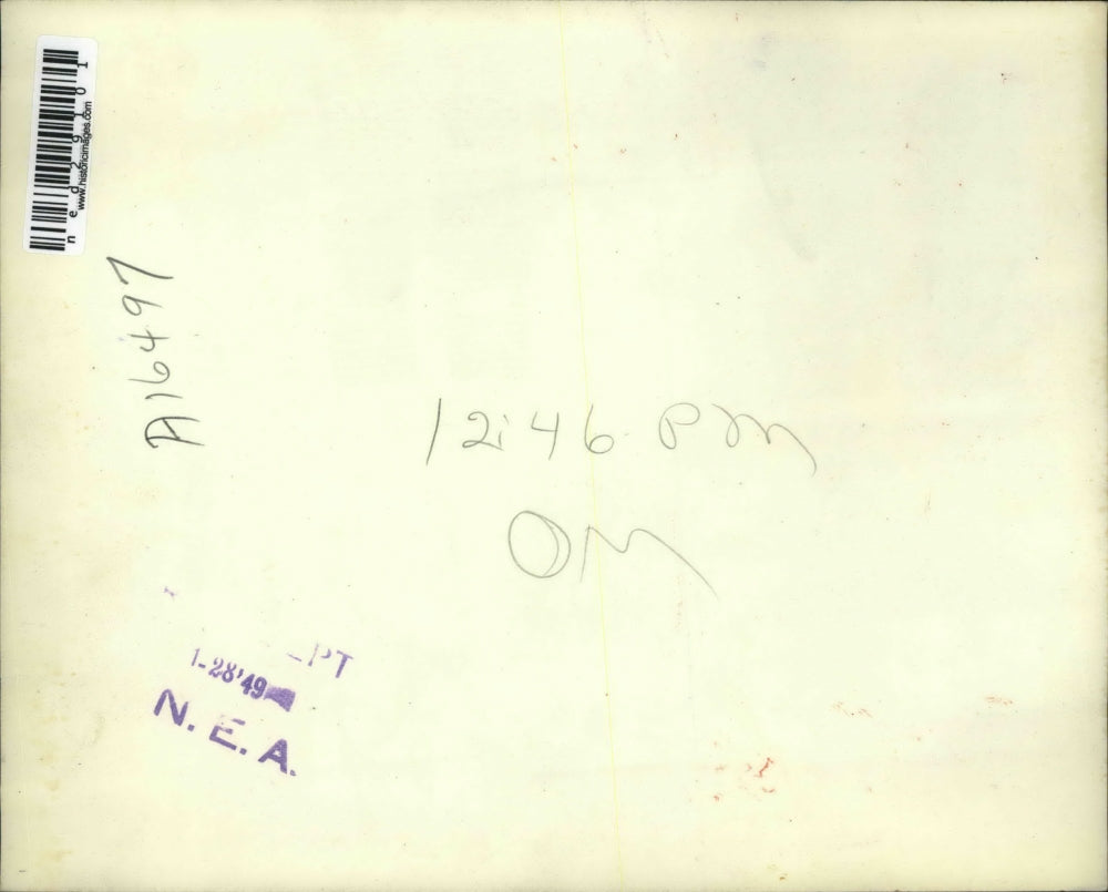 1948 Press Photo Officer Al Bitterolf dragging a stray pony into the station.