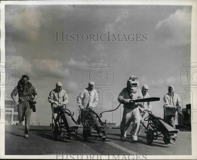 Load image into Gallery viewer, 1941 Press Photo Aircraft Carrier Fire Squad of H.H.S. Furious During Drill
