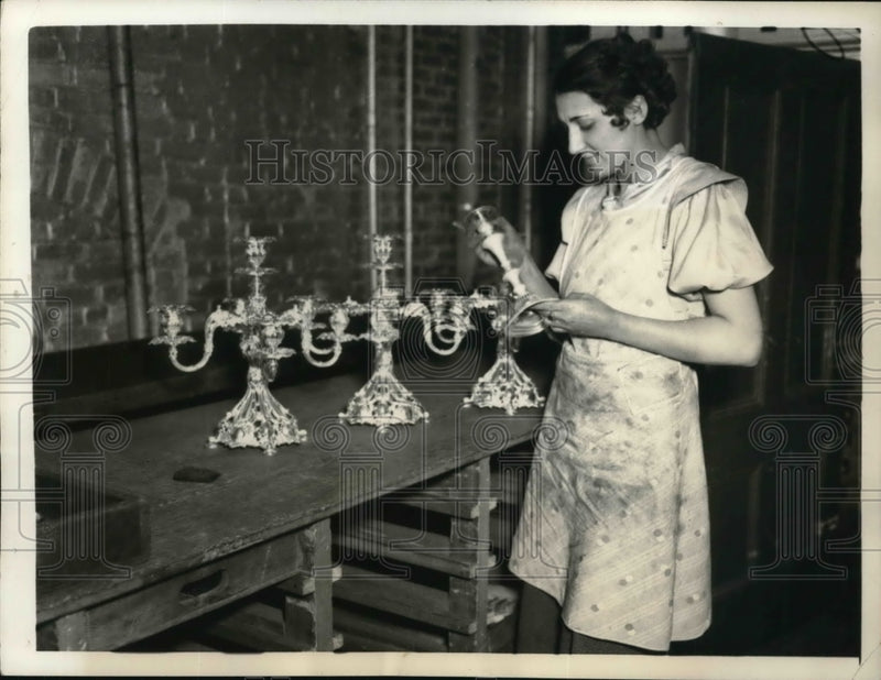 Load image into Gallery viewer, 1935 Press Photo Irene Blanc Of Reed And Barton Silver Plant With Candle Holder
