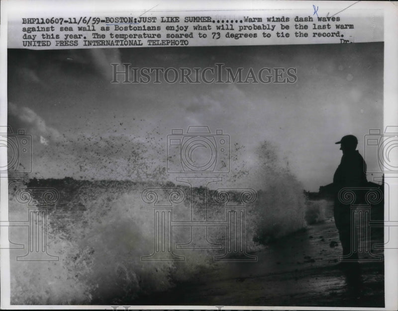 Load image into Gallery viewer, 1959 Press Photo Bostonian Enjoys Warm Temp On The Seashore
