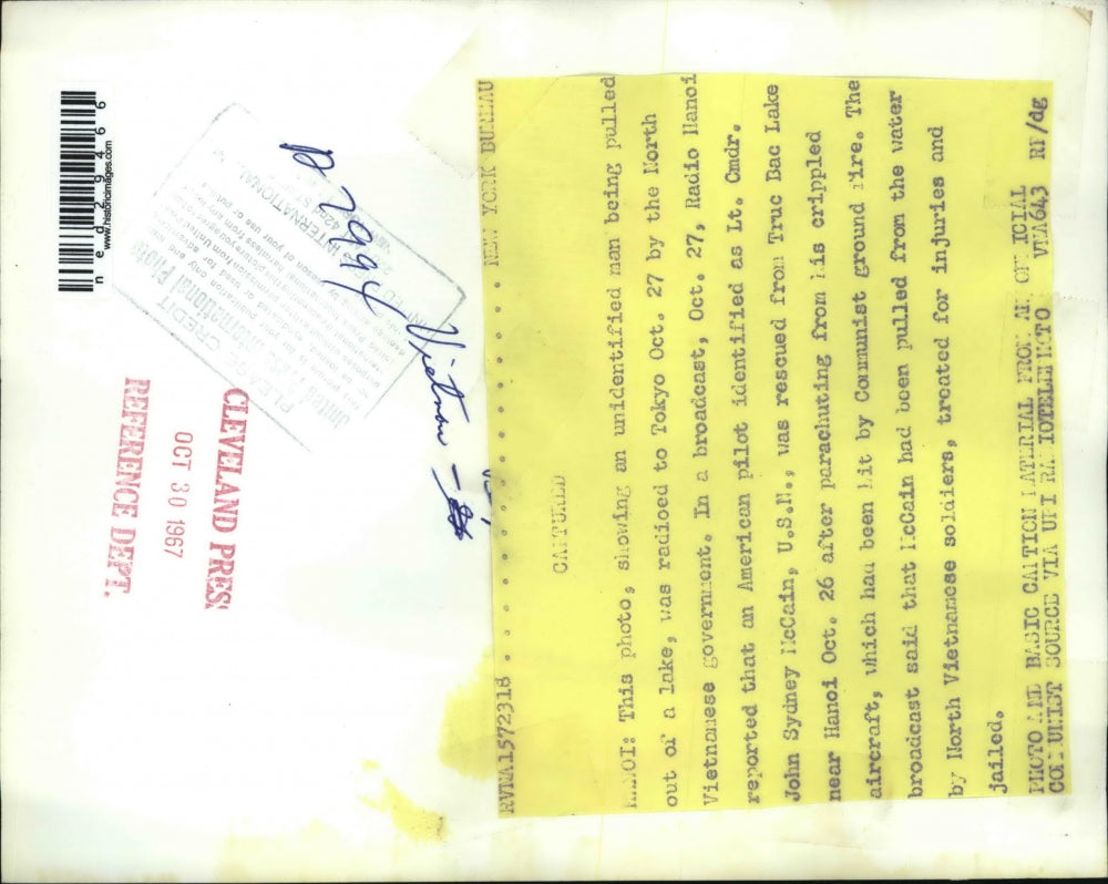 1967 Press Photo Unidentified man being pulled out of a lake