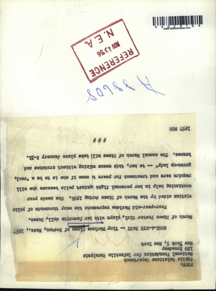 1957 Press Photo Marlene Olson of Boston Playing with Doll in Photography Shoot