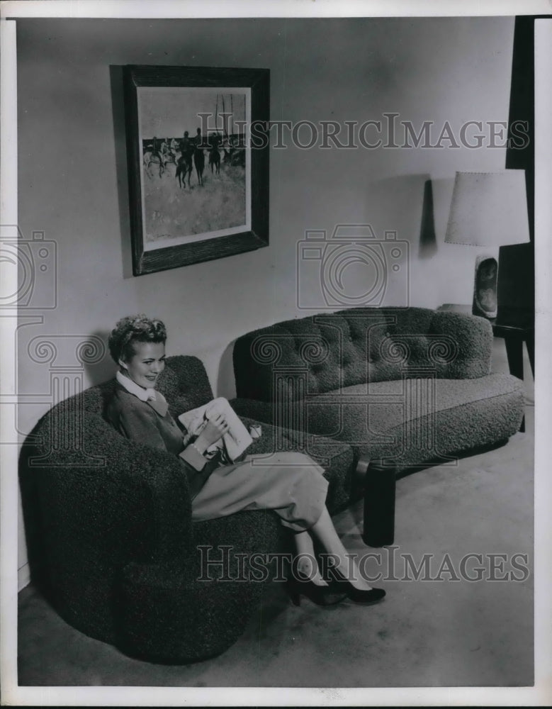 Load image into Gallery viewer, 1951 Press Photo Woman advertising sectional sofa
