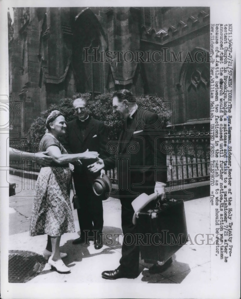 1957 Press Photo Herman Sidener talks to parishioner after closing church