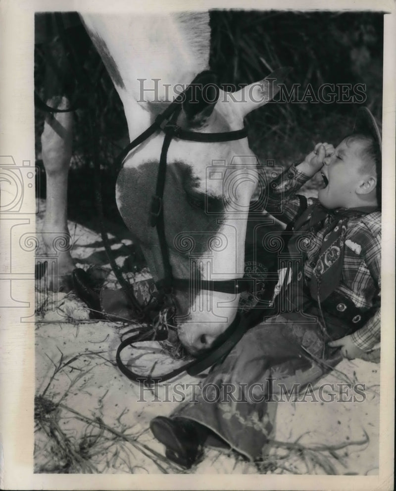 Load image into Gallery viewer, 1948 Press Photo Tommy O'Toole tumbled from his trusty mount at Florida Beach
