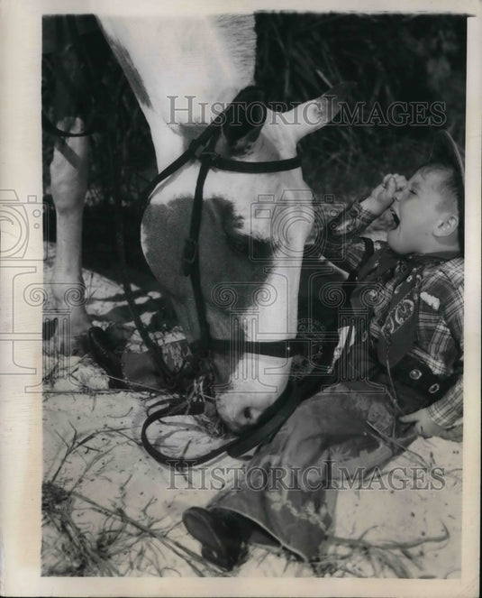 1948 Press Photo Tommy O'Toole tumbled from his trusty mount at Florida Beach