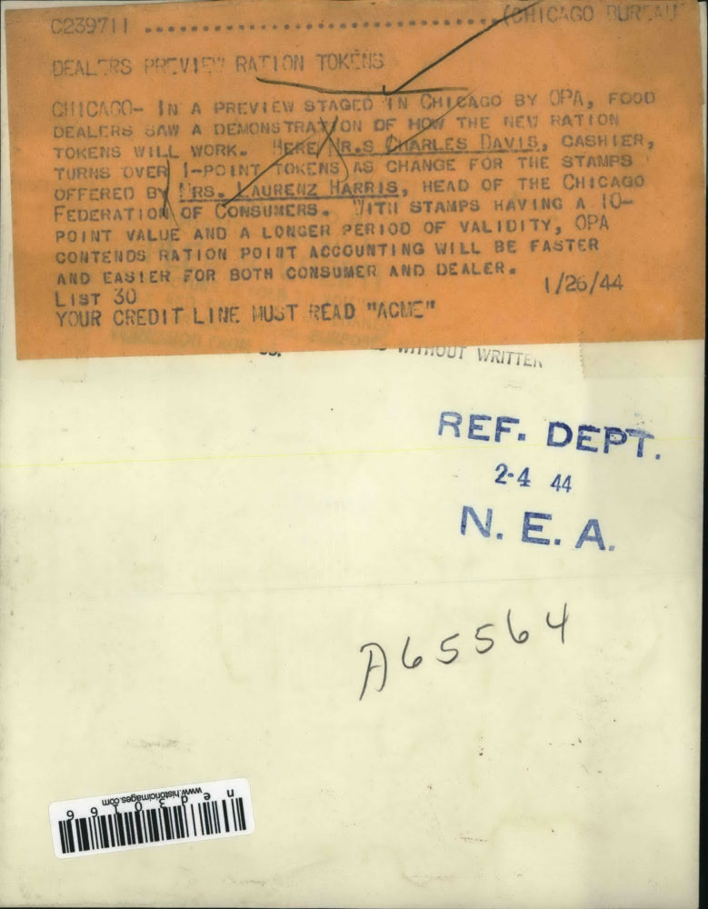 1944 Press Photo Charles Davis, Cashier, Turning Tokens Over as Change for Stamp