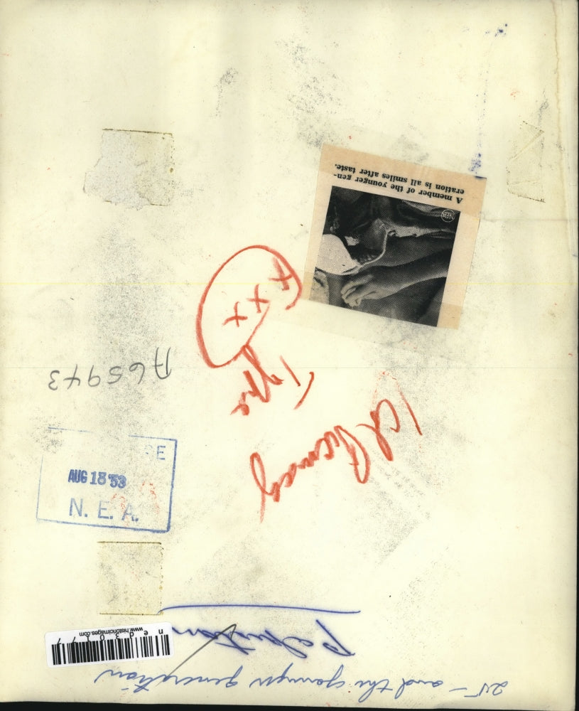 1953 Press Photo A Member Of The Younger Generation Is All Smiles After Taste