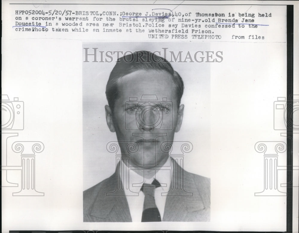 1957 Press Photo George J. Davies held on warrant for death of B.J. Doucette