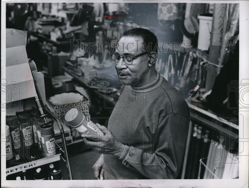 Load image into Gallery viewer, 1969 Press Photo Oscar L. Dennis, owner of Dennis Discout Paint &amp; Hardware
